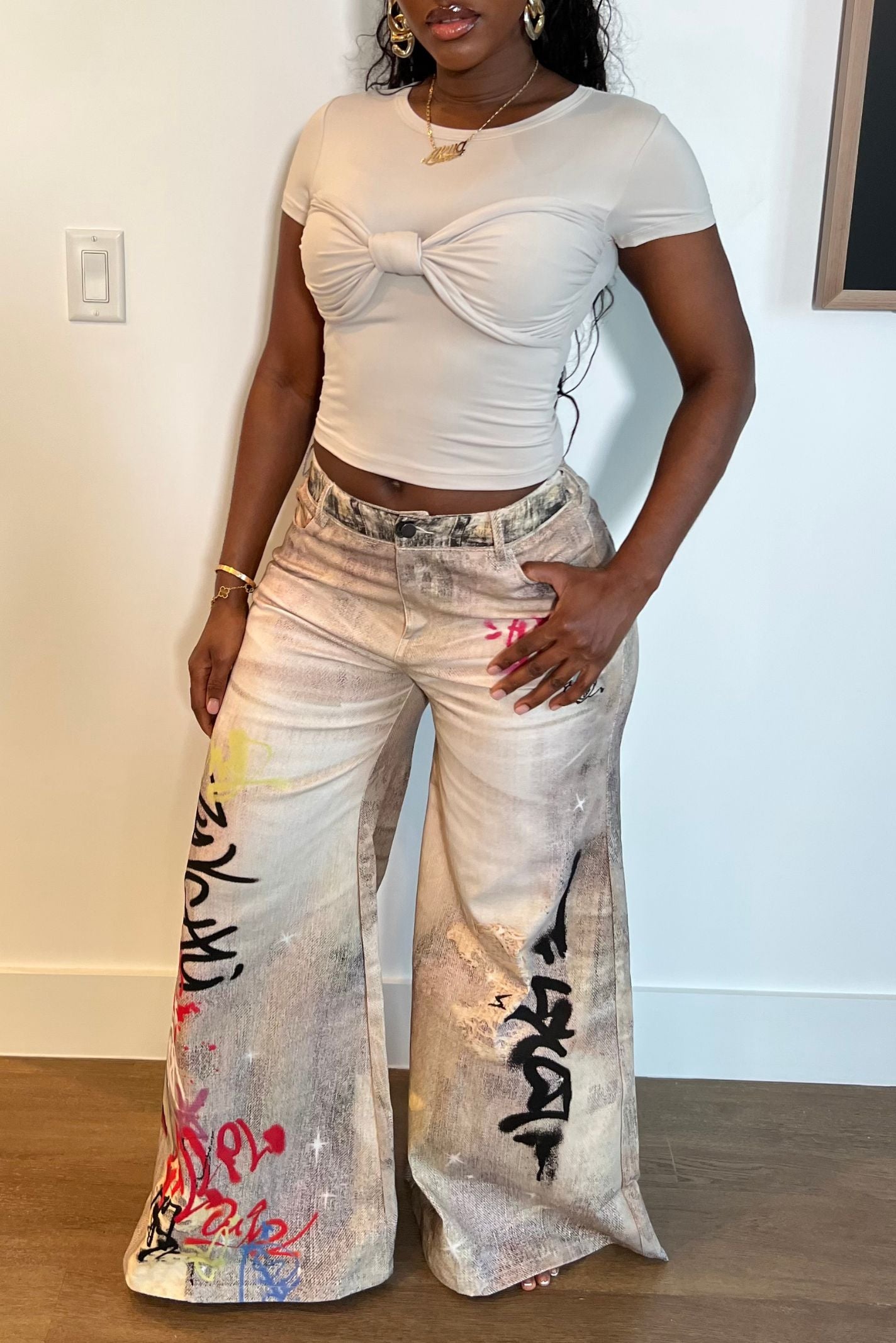 "WRITINGS ON THE WALL" JEANS