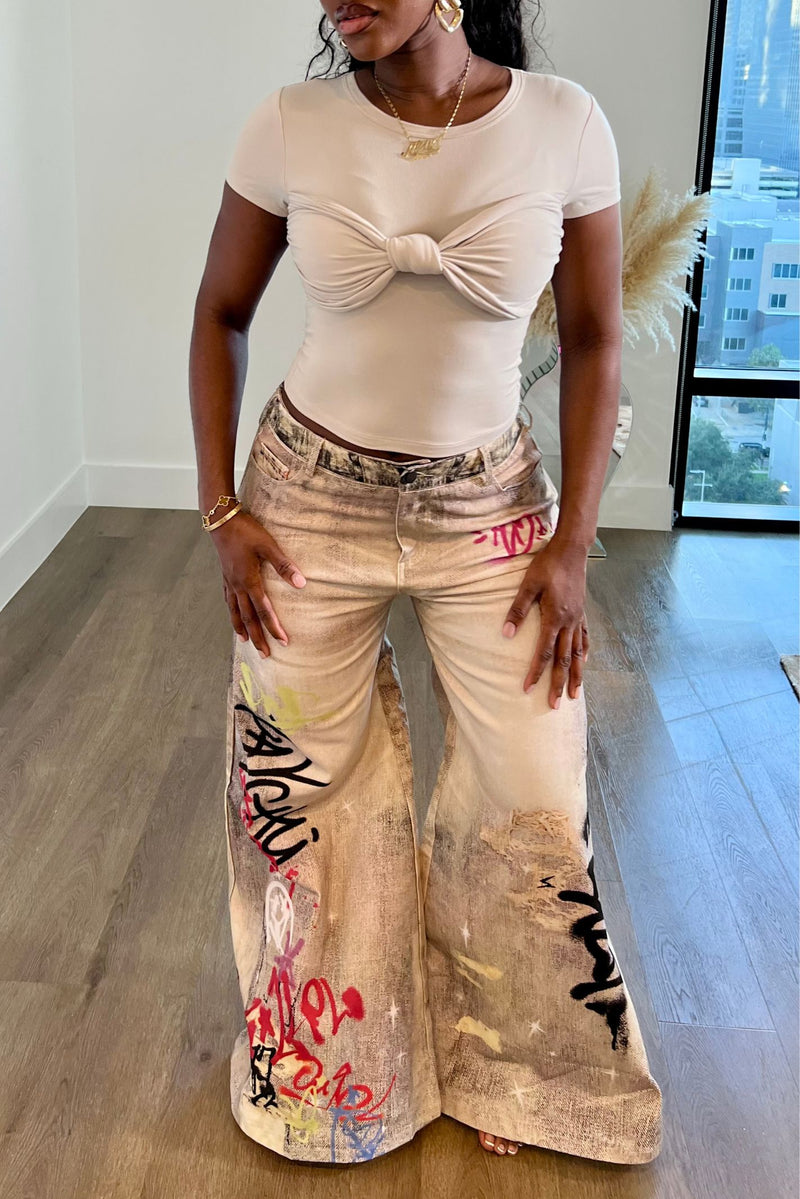 "WRITINGS ON THE WALL" JEANS