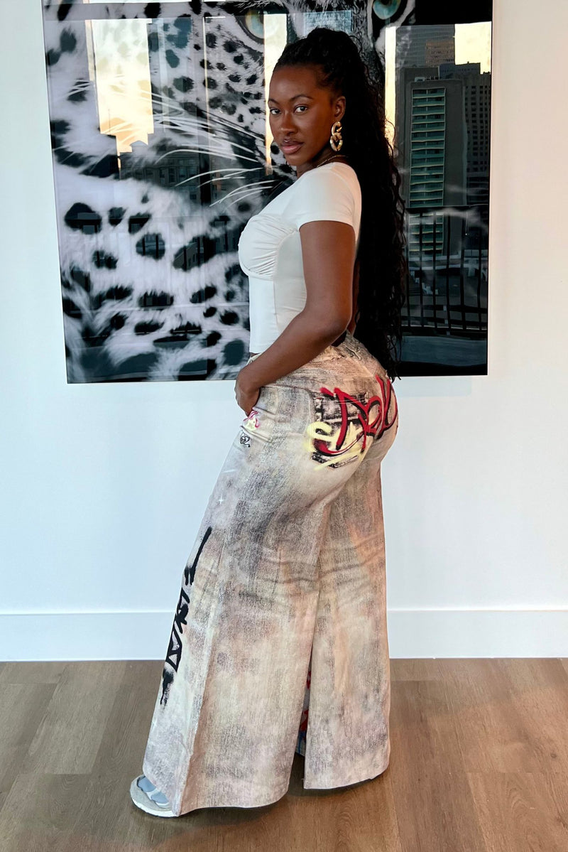 "WRITINGS ON THE WALL" JEANS