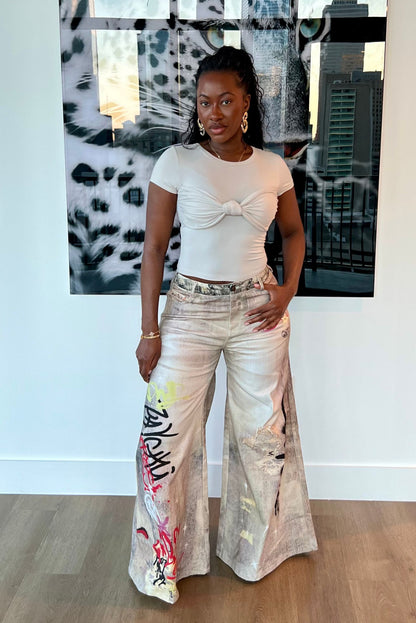 "WRITINGS ON THE WALL" JEANS
