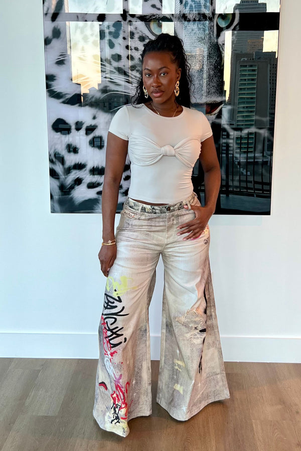 "WRITINGS ON THE WALL" JEANS