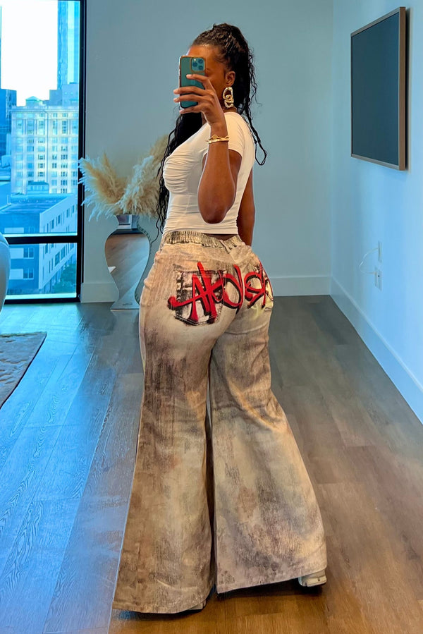 "WRITINGS ON THE WALL" JEANS