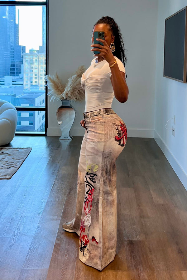 "WRITINGS ON THE WALL" JEANS
